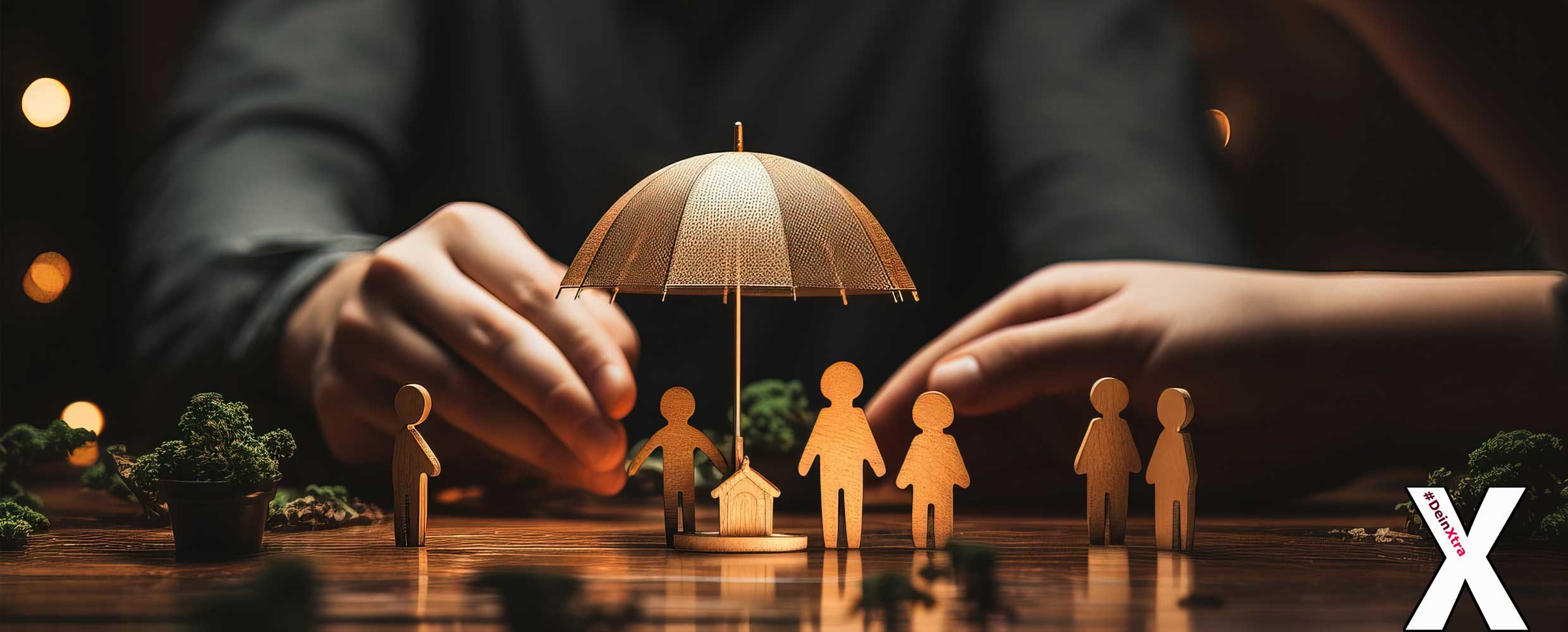 © Adobe Stock: Meow Creation Bild zeigt einen Schutzschirm für die Familie. © Adobe Stock: Meow Creation